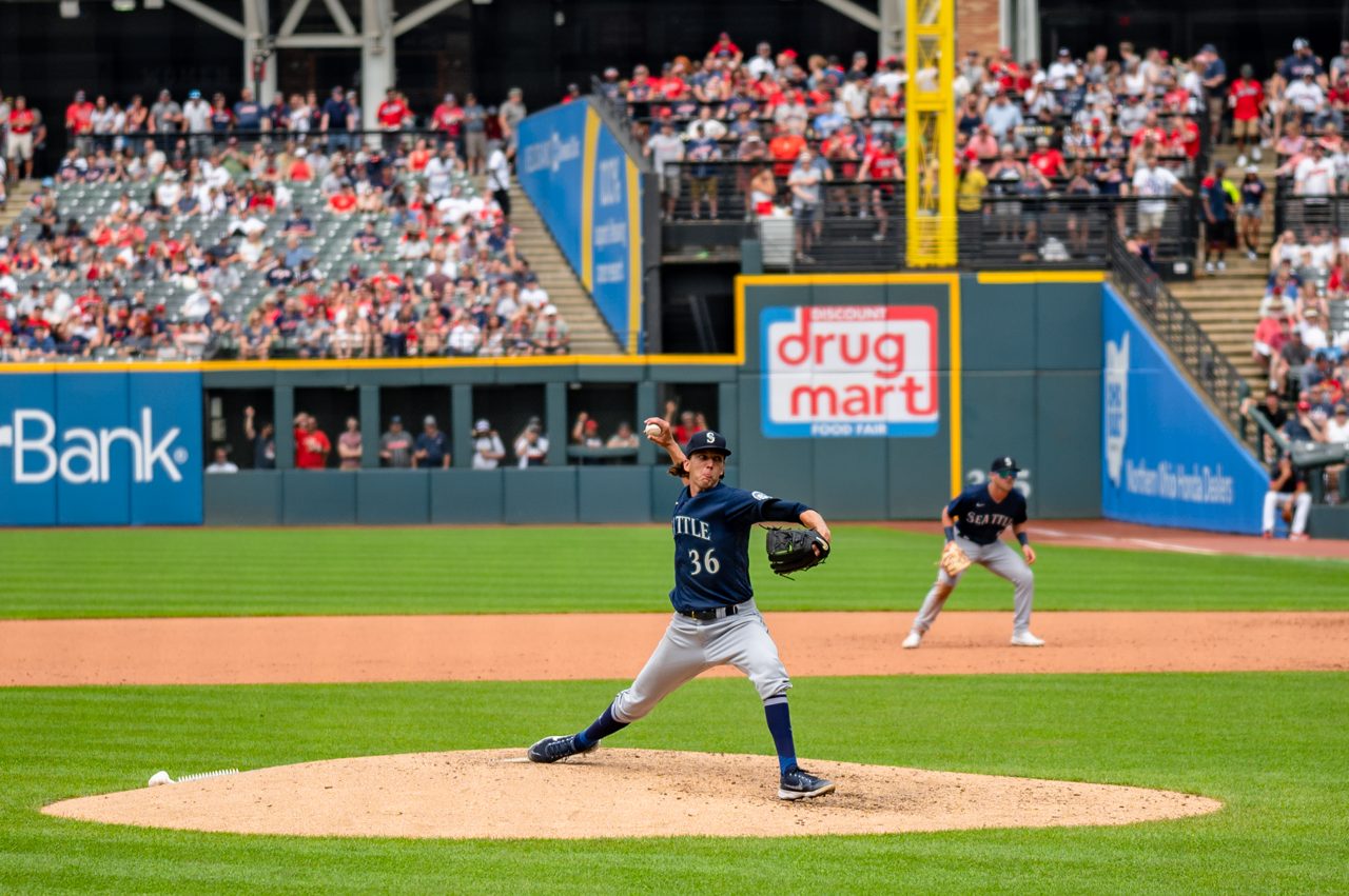 Logan Gilbert of the Seattle Mariners driving toward the plate in his delivery during a road start, the arm behind the Mariners-Rays under 7 on the July 11 board where Yoshinobu Yamamoto caps Arizona at Dodger Stadium and Cristopher Sanchez caps Detroit at Comerica Park
