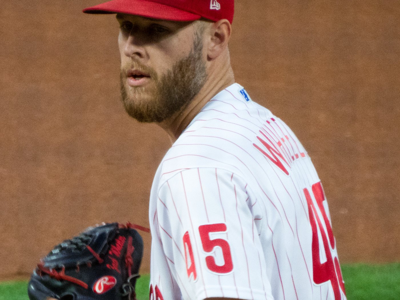 Zack Wheeler of the Philadelphia Phillies on the mound in pinstripes with his glove up, the arm behind the Phillies-Tigers under 7, first five innings under 3.5, and NRFI at Comerica Park on the July 12 first-half finale board